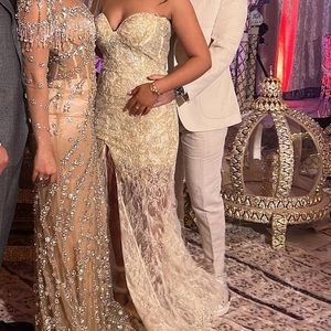 Gorgeous special event dress with feathers at the bottom!!